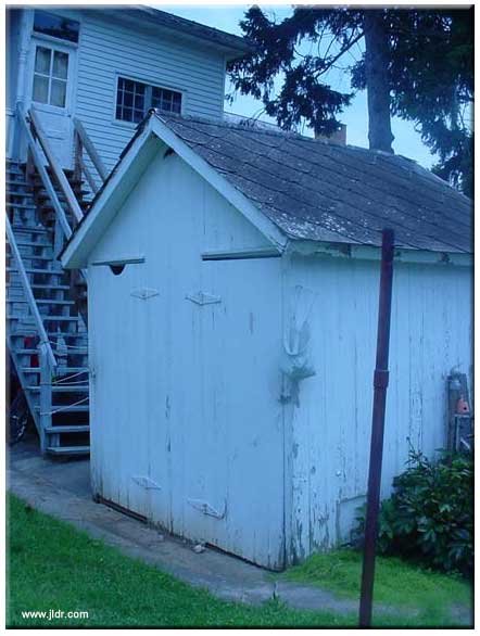 The Outhouse Front and Right Side View