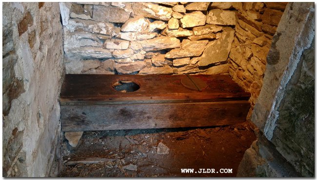 Inside the Quaker stone outhouse