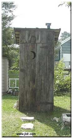 An Outhouse constructed from a collapsed barn