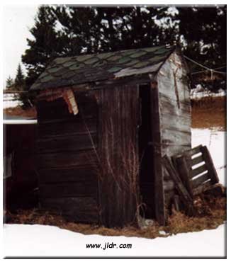 An old leaning outhouse in the UP