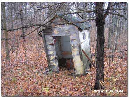 Notice the wooden door holder on the right
