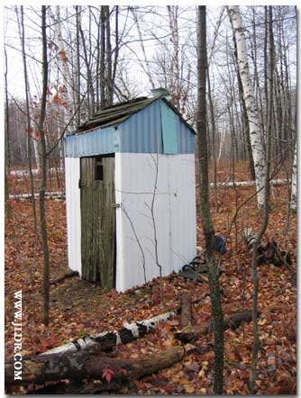 Notice the wooden door holder on the right