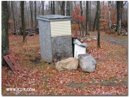 Outhouse near a trailer on Route 115 in Michigan