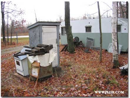 Outhouse close to the trailer