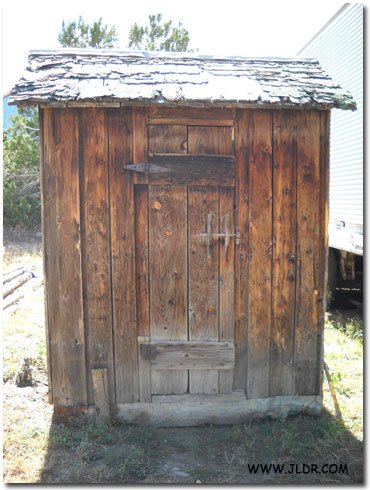 Front view of the 1900's Outhouse