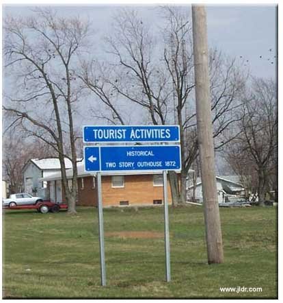 Sign pointing to the Historical Two Story Outhouse