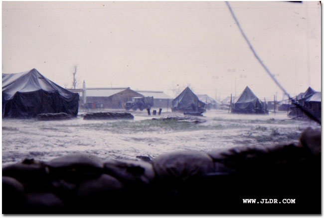 A downpour in Vietnam; Pee tubes in the distance...