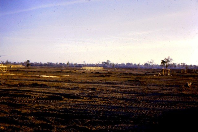 Building latrines after clearing the jungle