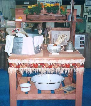 A display of washboards, rapid washers, chamber pots and other items