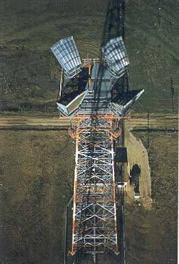 An Aerial HIGH UP View of an AT&T Microwave Radio Relay Site Outhouse