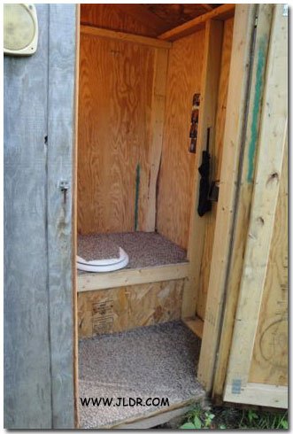 Carpeting installed inside the outhouse