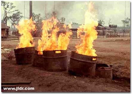 Burning excrement in Viet Nam behind the enemy lines; smoke could be seen for miles!
